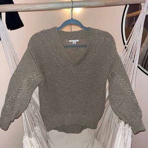 Green knitted sweater